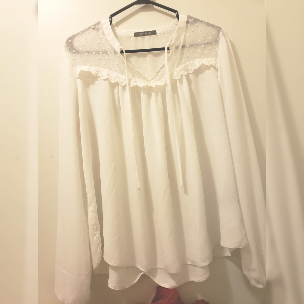 Classic white blouse for any occasion